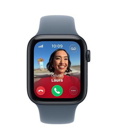 Apple Watch SE 3 com caixa meia-noite de alumínio e pulseira esportiva azul-âncora, a tela mostra uma chamada recebida com foto de contato e botões para atender e recusar a ligação, Digital Crown está do lado direito