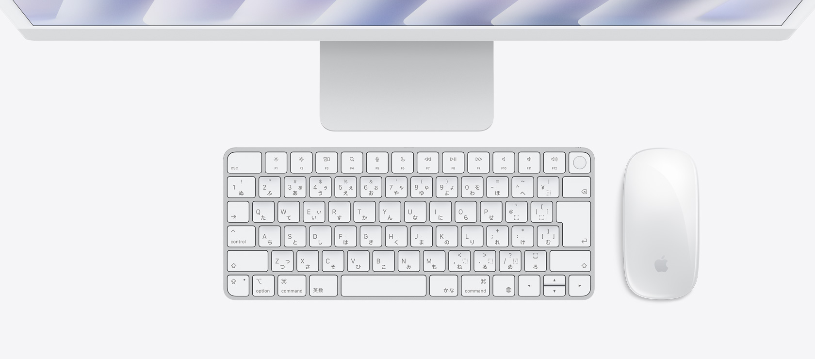 同じカラーのマウスとキーボードを合わせたシルバーのiMacを上から見た図