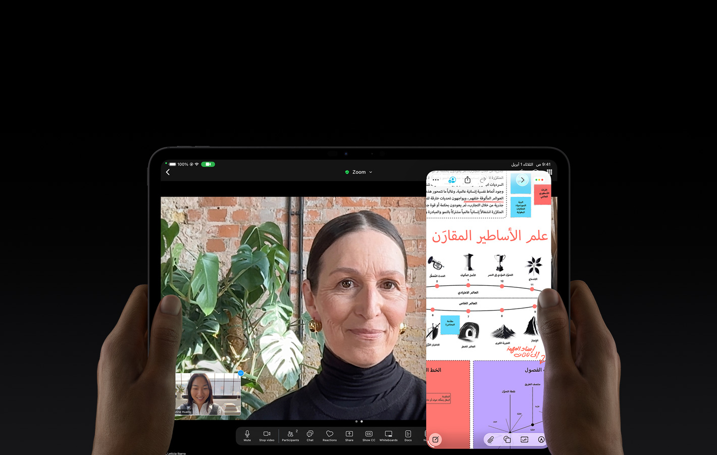 جهاز iPad Pro، الجزء الأمامي الخارجي، لون أسود فلكي، واجهة تعرض محادثة ملء الشاشة عبر تطبيق Zoom، وتطبيق تعليمي يُظهر عرضاً تقديمياً عن 'علم الأساطير المقارَن' مع نص ورسوم بيانية وملاحظات مكتوبة بخط اليد