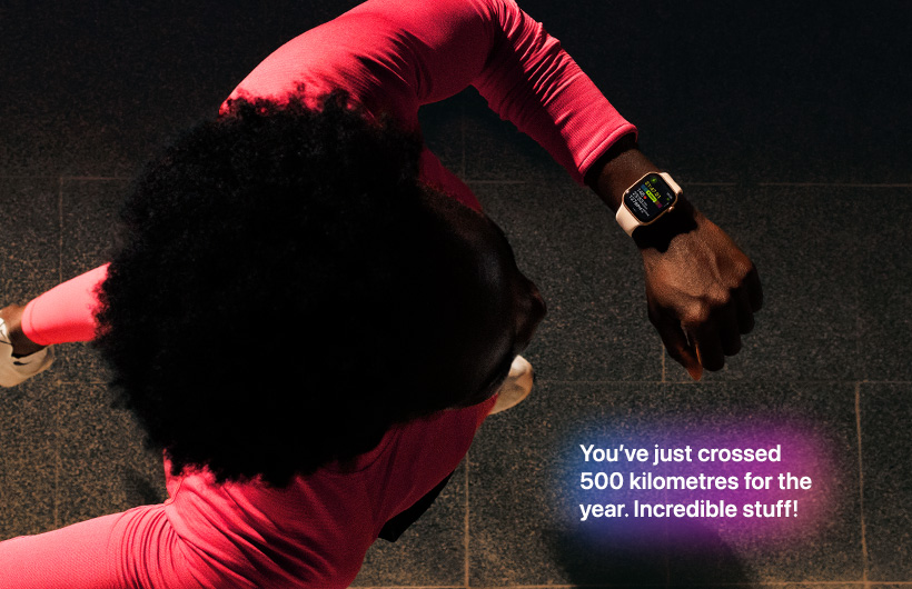 A person checks progress on Apple Watch Series 11 Workout app while running