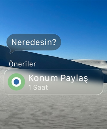 Yarı saydam “Neredesin?” mesajı ve altında Önerilenler kısmında “1 saat boyunca Konumu Paylaş” yazan akıllı bir eylem yer alıyor