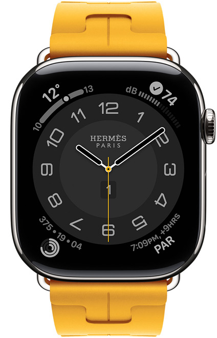 Apple Watch Hermès Series 11, Circulaire watch face (hour, minute, second hands, Hermès Paris logo, complications: Weather, activity rings, Paris time and UV Index), titanium case, silver colour, right side exterior, Digtial Crown, paired with Kilim Single Tour strap, jaune colour (canary yellow), fluoroelastomer rubber material