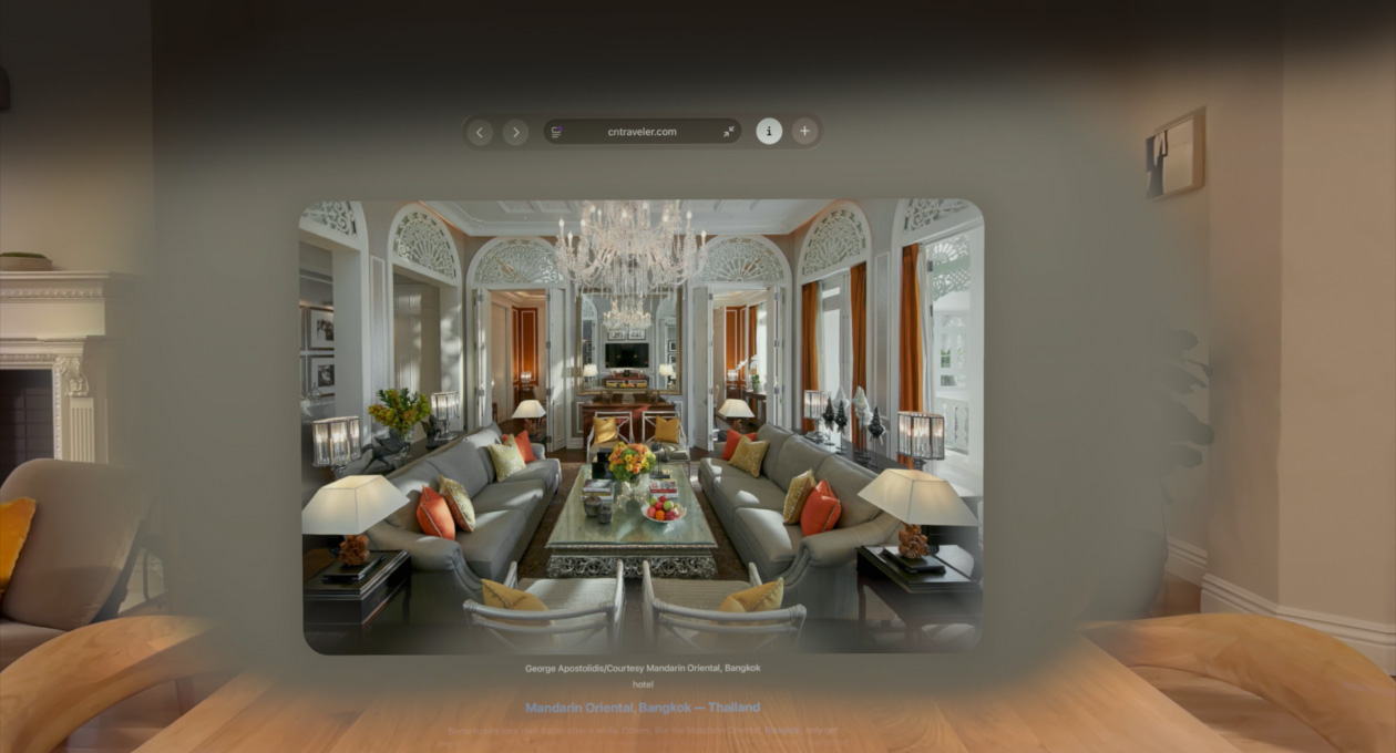 Safari web page featuring inline spatial scene of living room with long deep hallways in background