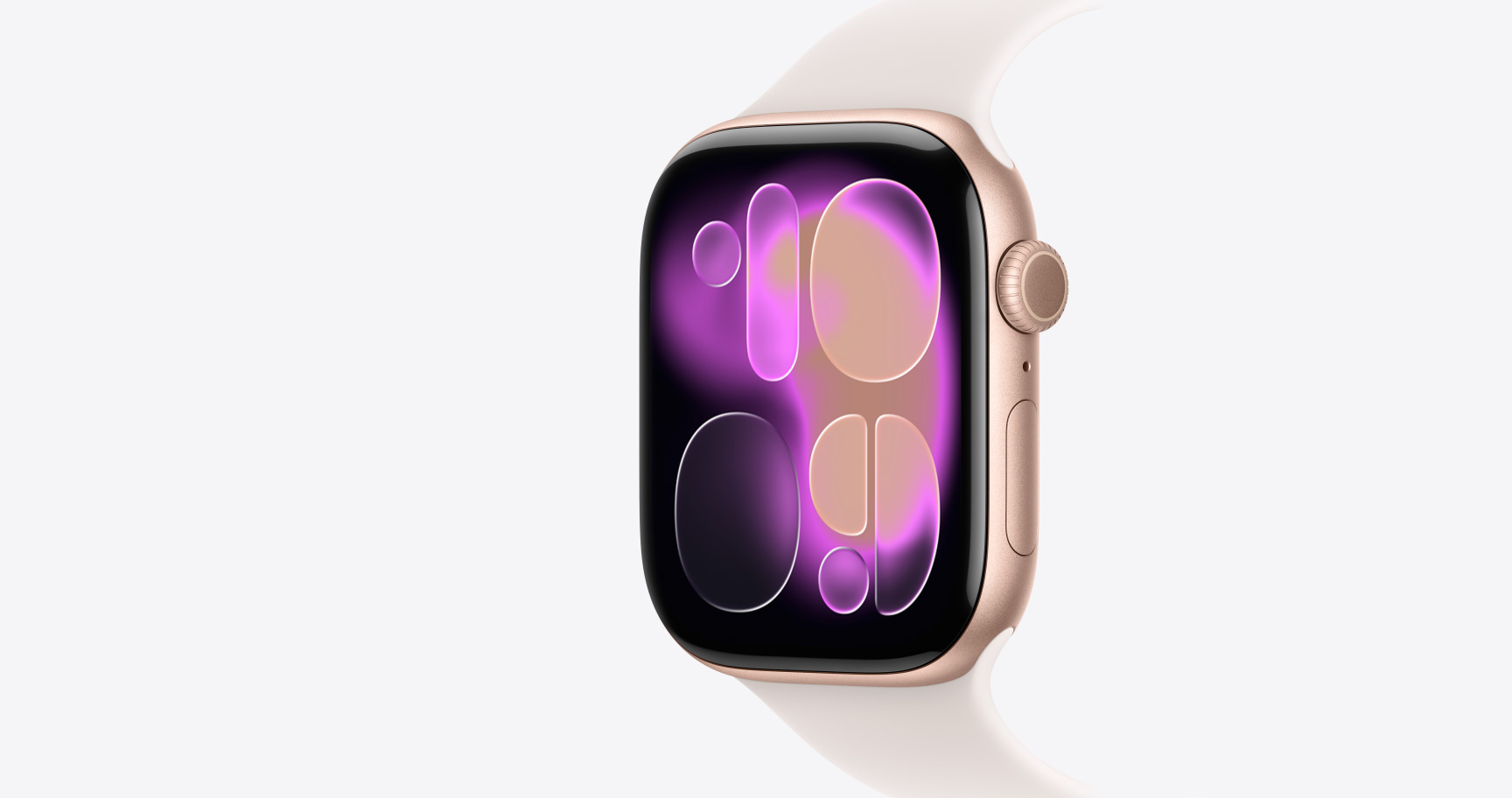 Apple Watch Series 11, rose gold color, aluminum case, Responsive Art watch face, right side exterior, Digital Crown, microphone, side button, Sport Band, light blush color