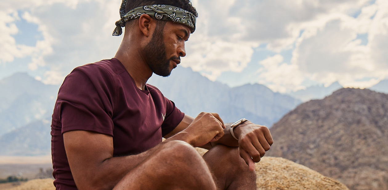 A man checking his Apple Watch.