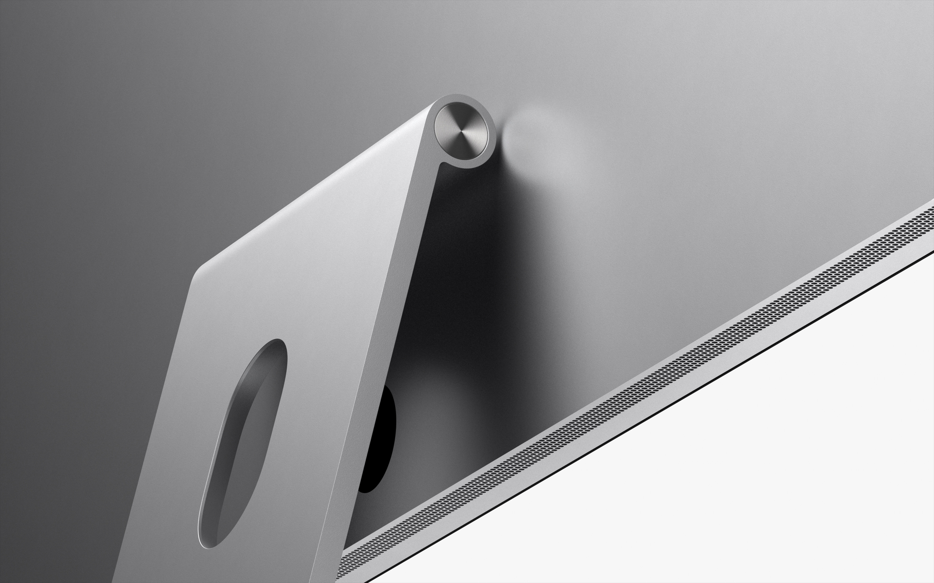 Pohľad zozadu na Studio Display namontovaný na stojane s nastaviteľným sklonom